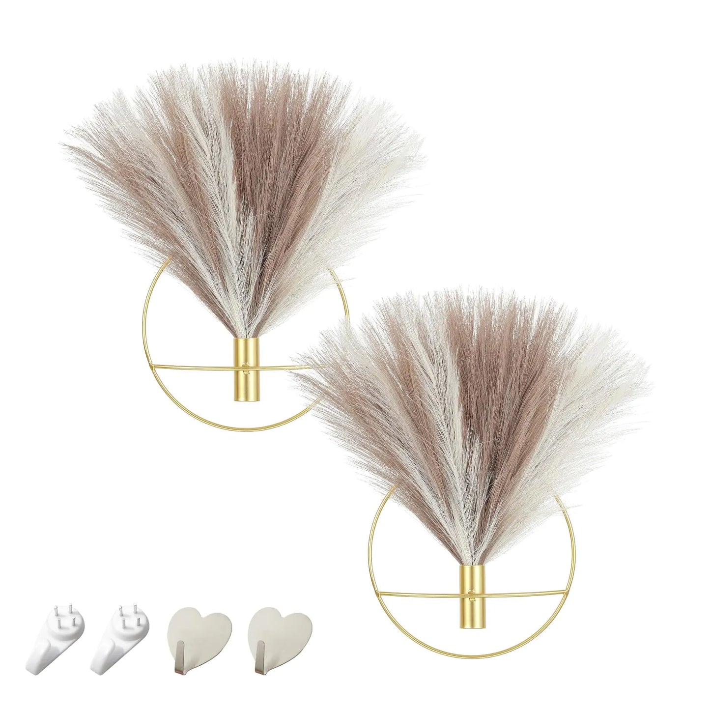 Boho wall decor featuring two wall-mounted metal decorations with faux pampas grass and gold rings.